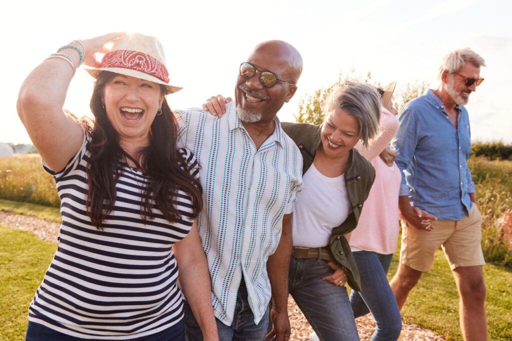 A group of older adults outside on a walk