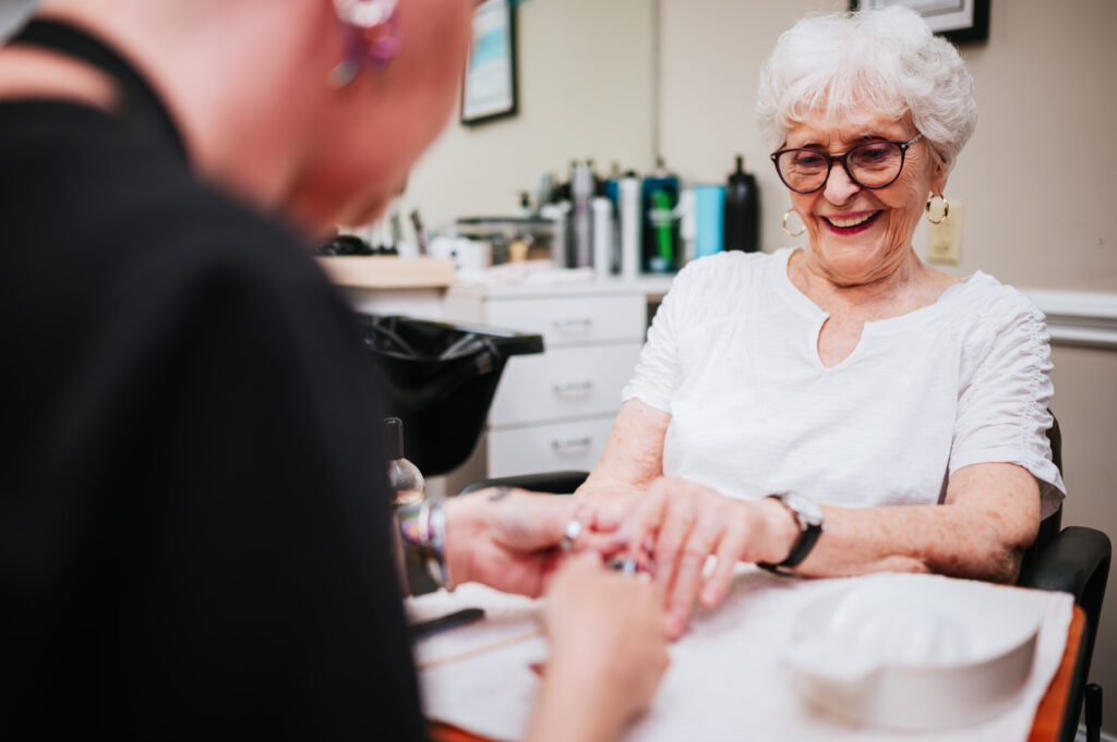 Woman getting her nails done