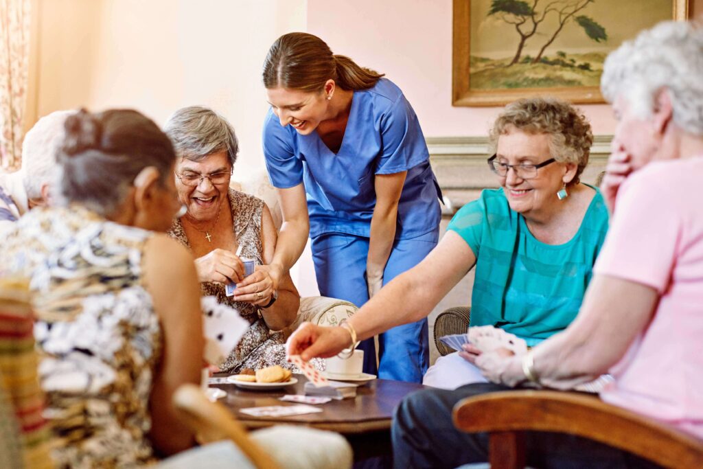 Cropped shot of seniors playing cards in their retirement home